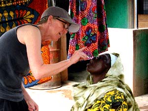 Adjoa Maragaret Stack administering a remedy in Ghana